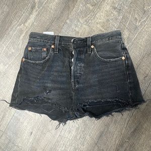 Levi’s black distressed denim shorts size 24